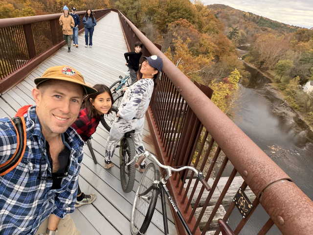 Fall bike ride on the trail bridge